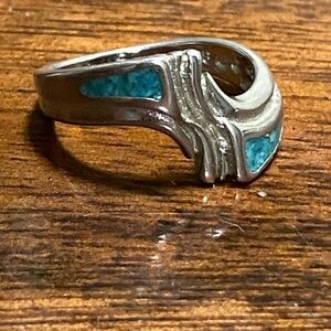 vintage sterling silver ring featuring a distinctive turquoise inlay